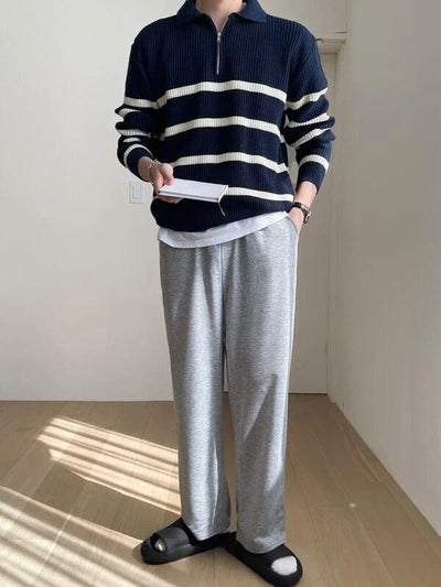 Stylischer gestreifter Pullover mit Viertelreißverschluss